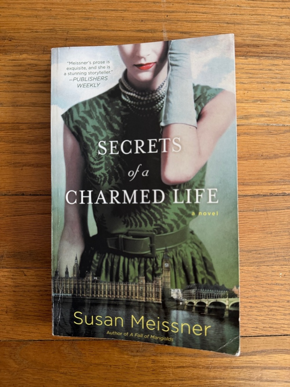 📚 Paperback book “Secrets of a Charmed Life” by Susan Meissner.